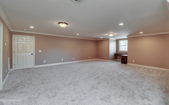 carpeted empty room with ornamental molding