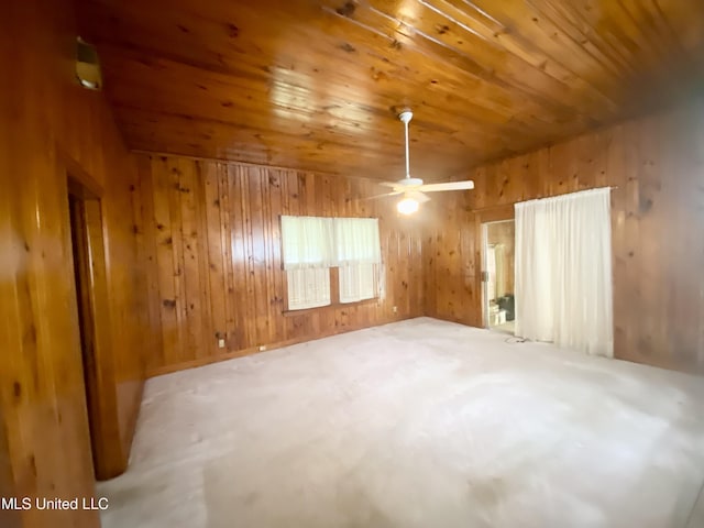613 Georgetown St, Hazlehurst, MS 39083 - unfurnished room featuring wood walls, wooden ceiling, and a ceiling fan