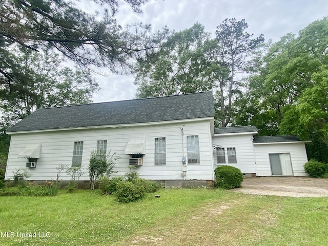 613 Georgetown St, Hazlehurst, MS 39083 - back of house with a lawn, roof with shingles, a patio, and crawl space