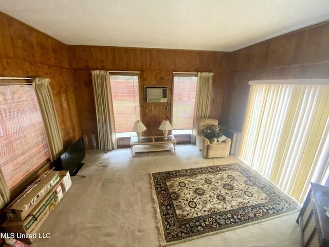 613 Georgetown St, Hazlehurst, MS 39083 - living area featuring carpet, wooden walls, and a wall unit AC