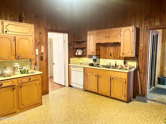 613 Georgetown St, Hazlehurst, MS 39083 - kitchen featuring dishwasher, wooden walls, light countertops, light floors, and open shelves