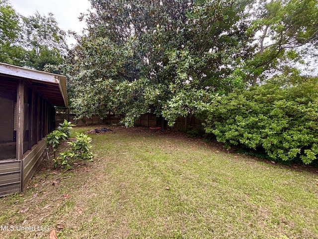 view of yard with fence