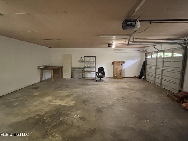 garage featuring a garage door opener