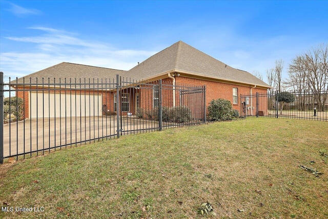 view of home's exterior featuring brick siding, a yard, concrete driveway, an attached garage, and fence