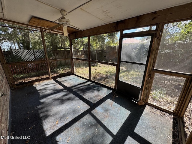 unfurnished sunroom with a wealth of natural light