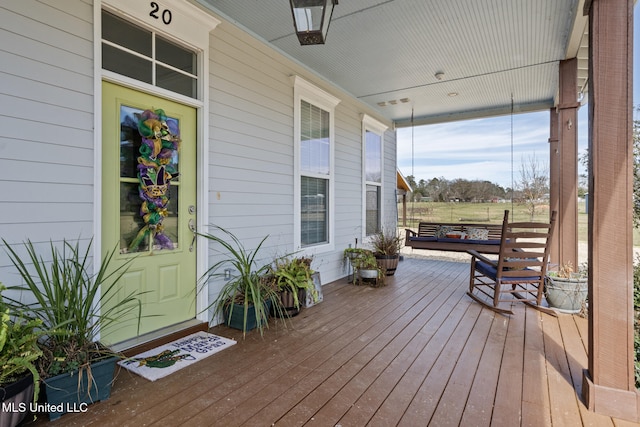 deck featuring a porch