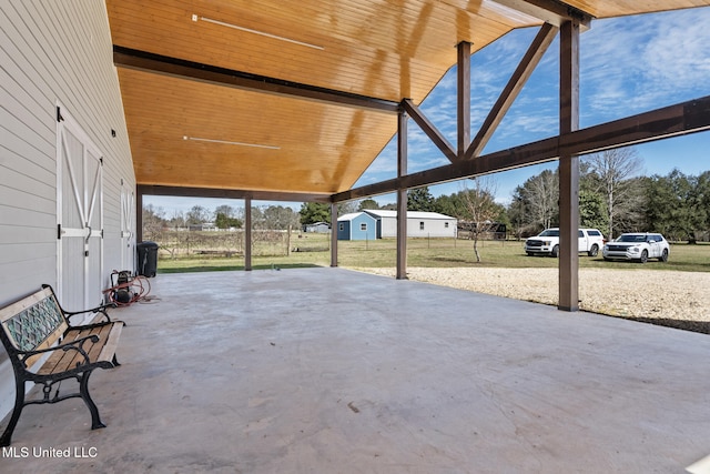 view of patio featuring fence