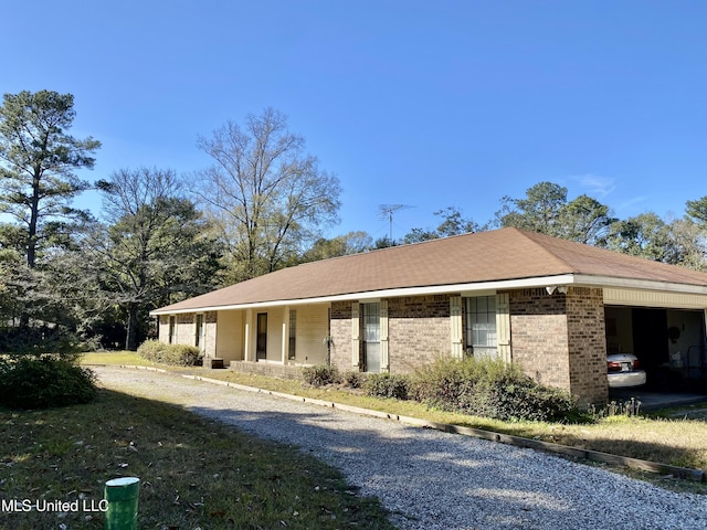 view of side of property featuring a garage