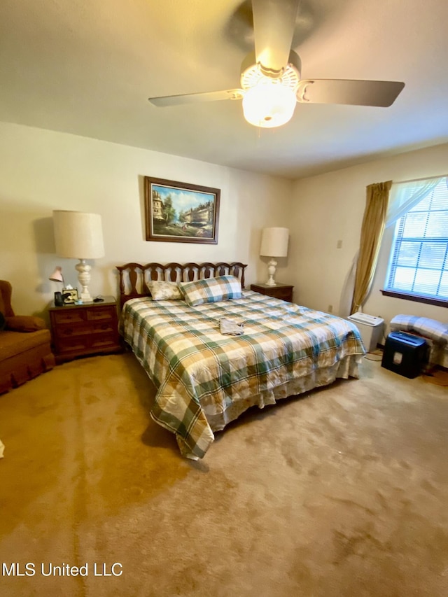 bedroom with carpet flooring and ceiling fan