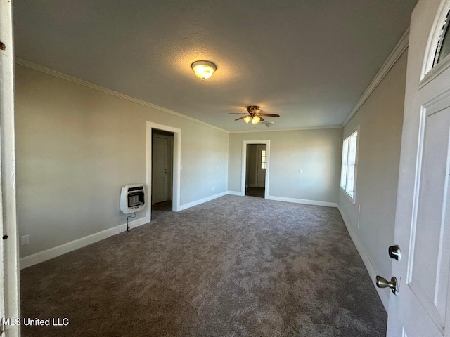 unfurnished bedroom featuring crown molding, heating unit, and dark carpet