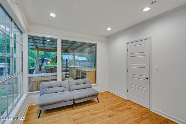 102 Holly Trl, Brandon, MS 39047 - sitting room with crown molding, plenty of natural light, light wood-style flooring, recessed lighting, and baseboards