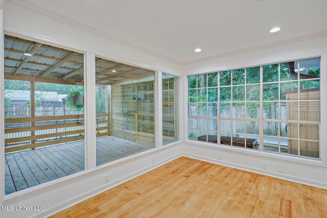 102 Holly Trl, Brandon, MS 39047 - unfurnished sunroom with wood finished floors, baseboards, and recessed lighting