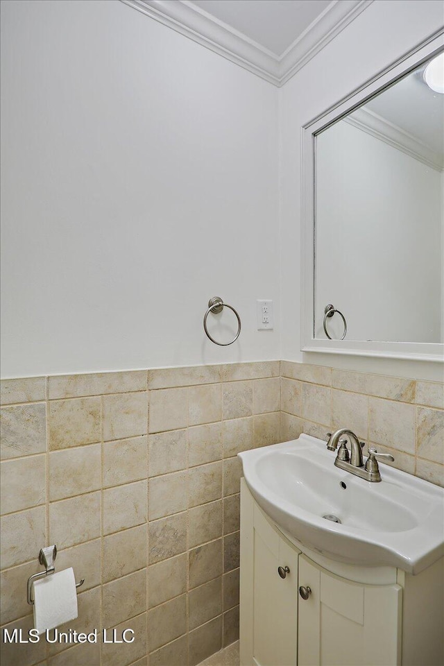 102 Holly Trl, Brandon, MS 39047 - bathroom with vanity, crown molding, tile walls, and a wainscoted wall