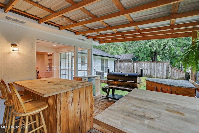 102 Holly Trl, Brandon, MS 39047 - wooden terrace with a jacuzzi