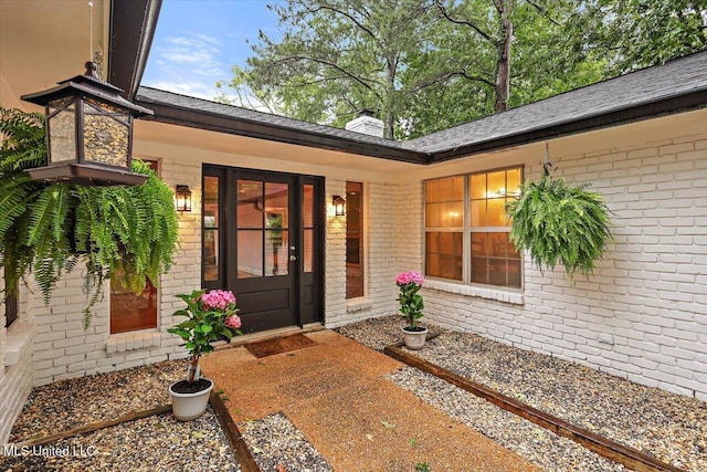102 Holly Trl, Brandon, MS 39047 - doorway to property with brick siding and a chimney