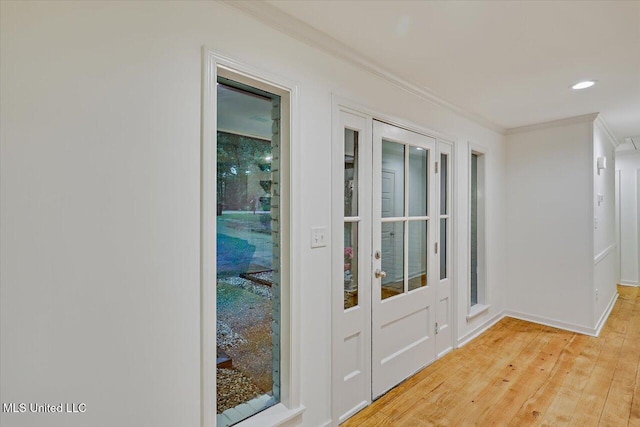 102 Holly Trl, Brandon, MS 39047 - doorway to outside featuring ornamental molding, light wood-style flooring, and recessed lighting