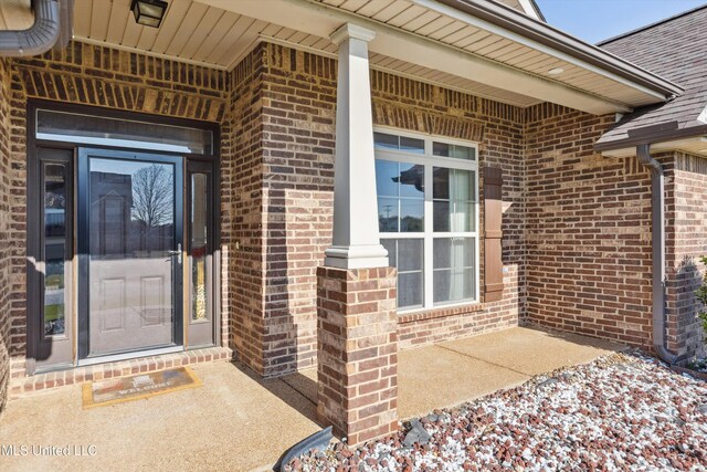 7637 Wisteria Dr, Olive Branch, MS 38654 - view of exterior entry with brick siding