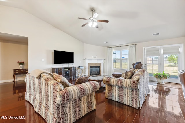 7637 Wisteria Dr, Olive Branch, MS 38654 - living room with baseboards, a tiled fireplace, ceiling fan, dark wood finished floors, and lofted ceiling