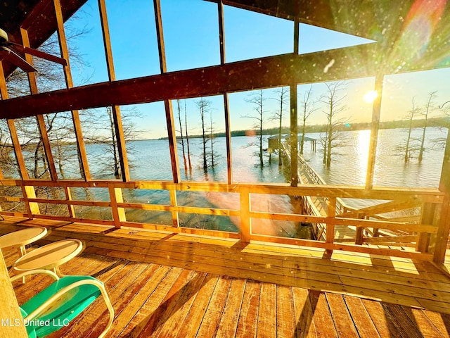 dock area with a deck with water view