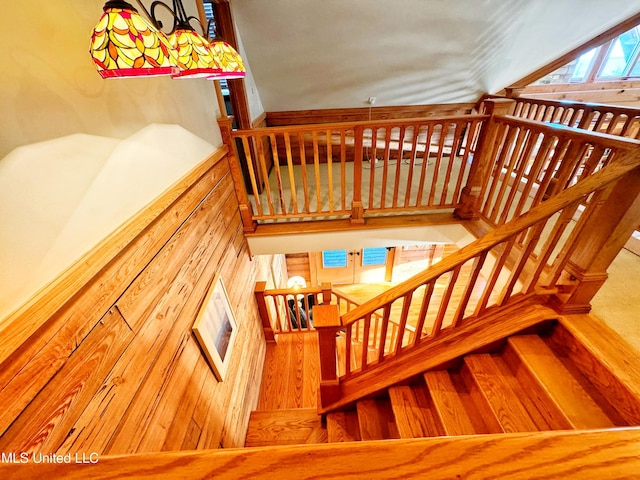 stairway with wood-type flooring