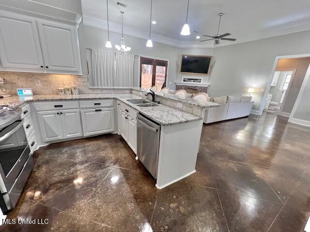 kitchen with decorative light fixtures, white cabinetry, dishwasher, kitchen peninsula, and light stone countertops