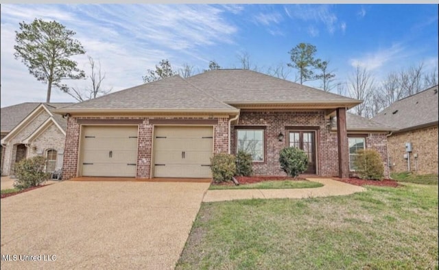 single story home with a garage and a front yard