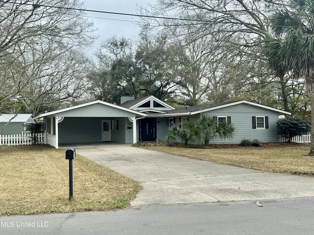 ranch-style home with a carport and a front yard