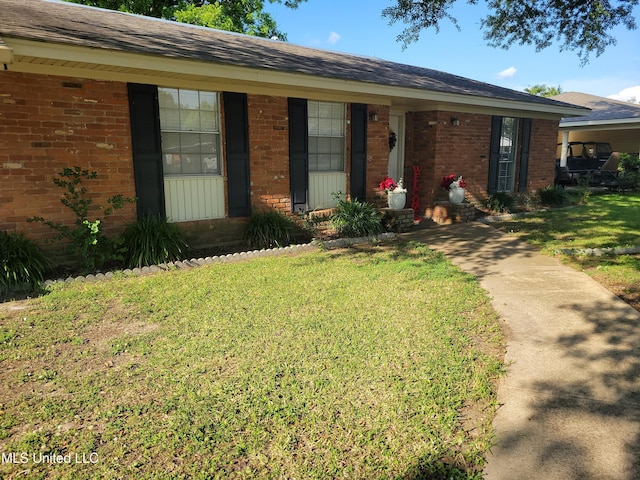 166 Lee Ave, Vidalia, LA 71373 - single story home featuring brick siding, a front yard, and a porch