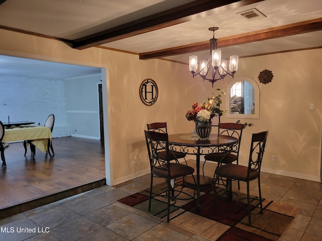 166 Lee Ave, Vidalia, LA 71373 - tiled dining space featuring beamed ceiling, a chandelier, baseboards, and ornamental molding
