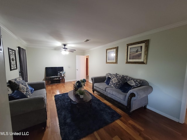 166 Lee Ave, Vidalia, LA 71373 - living area with wood finished floors, ornamental molding, a ceiling fan, and baseboards