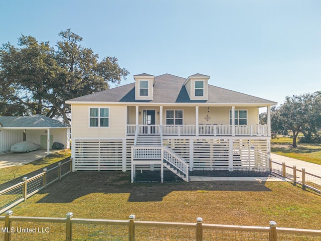 view of front of property featuring a porch and a front lawn