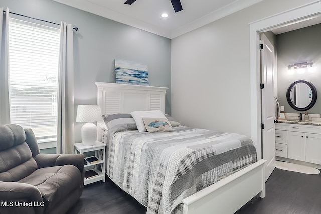 bedroom with dark wood-type flooring, ornamental molding, and multiple windows