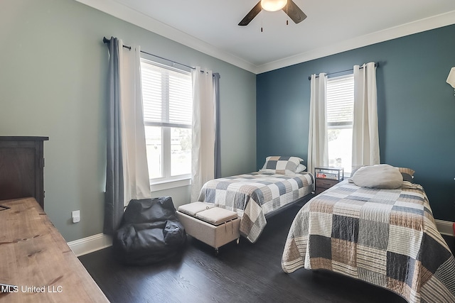 bedroom featuring crown molding, hardwood / wood-style floors, and ceiling fan