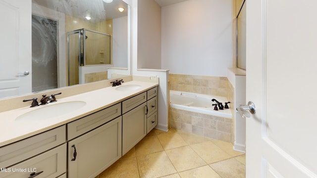 bathroom featuring vanity, tile patterned floors, and shower with separate bathtub