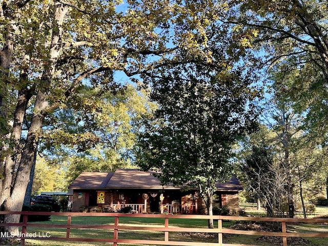 view of community featuring a lawn