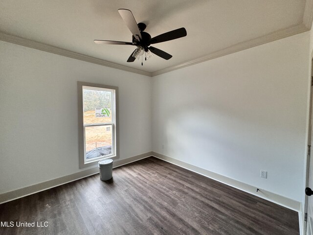 unfurnished room featuring dark wood-type flooring, ornamental molding, and ceiling fan