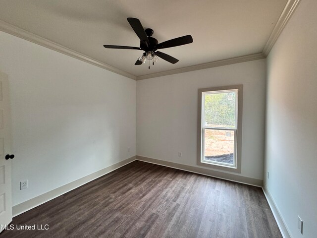 spare room with ornamental molding, dark hardwood / wood-style floors, and ceiling fan