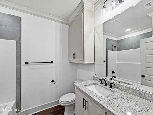 bathroom featuring crown molding, vanity, wood-type flooring, a shower, and toilet