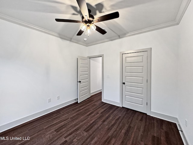 unfurnished bedroom featuring ceiling fan, ornamental molding, and dark hardwood / wood-style flooring