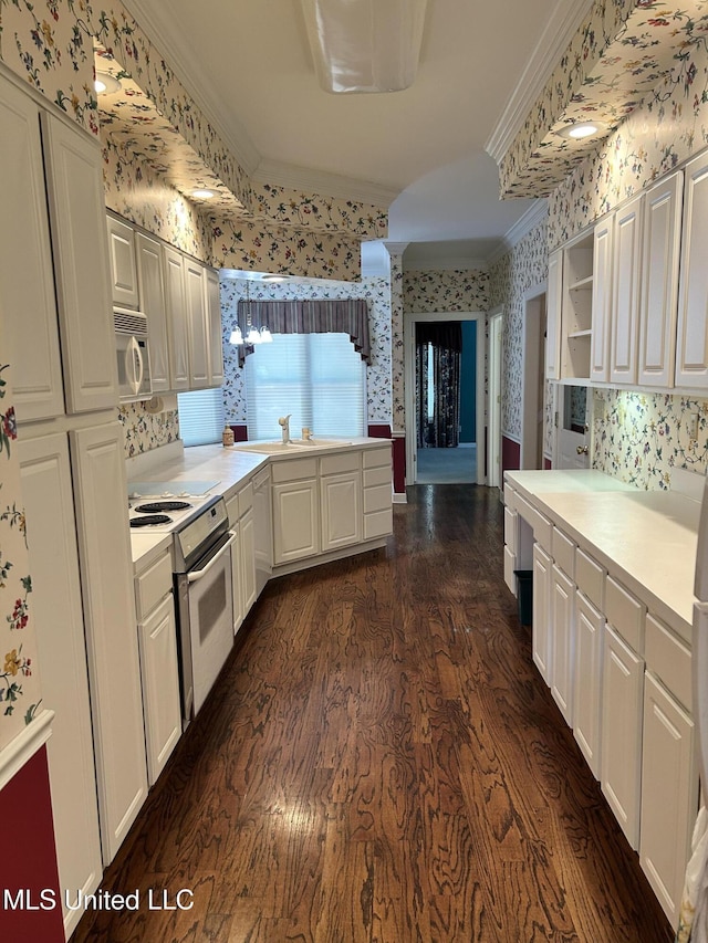 8136 Saddlebrook Cv, Olive Branch, MS 38654 - kitchen with wallpapered walls, white appliances, ornamental molding, light countertops, and dark wood-style flooring