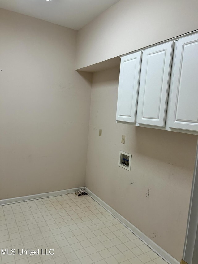 8136 Saddlebrook Cv, Olive Branch, MS 38654 - laundry area with cabinet space and hookup for a washing machine
