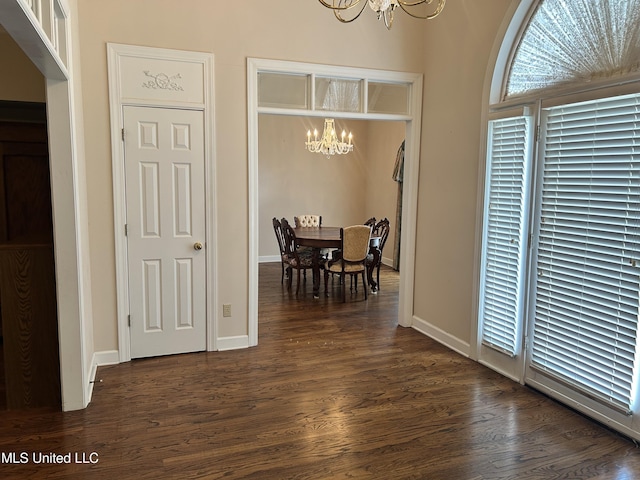 8136 Saddlebrook Cv, Olive Branch, MS 38654 - dining space with a chandelier and dark wood finished floors
