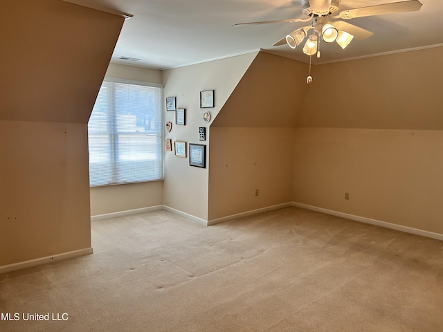 8136 Saddlebrook Cv, Olive Branch, MS 38654 - bonus room with a ceiling fan, light carpet, and lofted ceiling