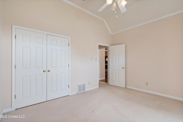 8136 Saddlebrook Cv, Olive Branch, MS 38654 - unfurnished bedroom featuring crown molding, carpet floors, lofted ceiling, a closet, and ceiling fan