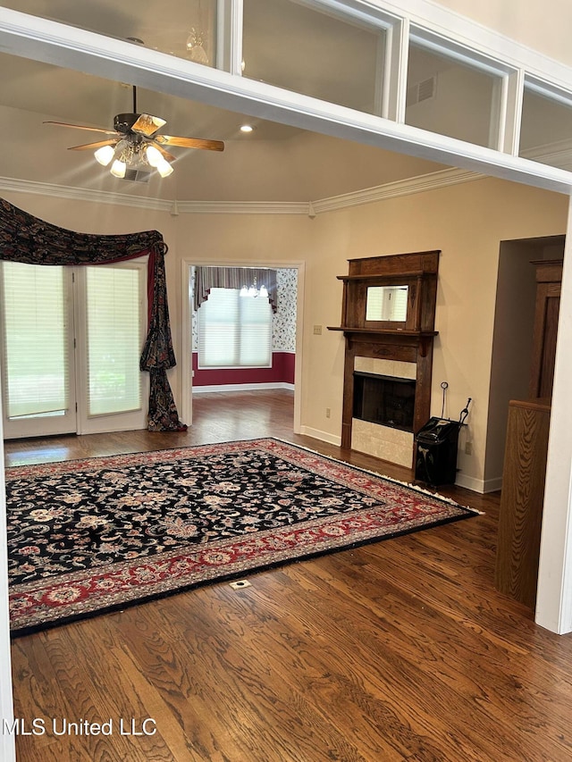 8136 Saddlebrook Cv, Olive Branch, MS 38654 - unfurnished living room featuring crown molding, ceiling fan, a fireplace, wood finished floors, and recessed lighting