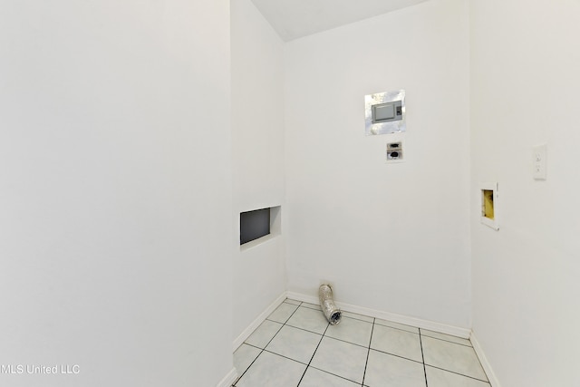 washroom featuring light tile patterned floors, washer hookup, and electric dryer hookup