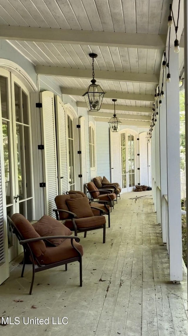 view of patio / terrace with covered porch and french doors