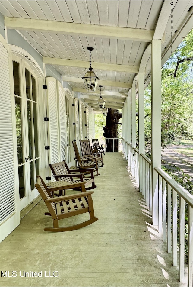 view of patio with a porch and french doors