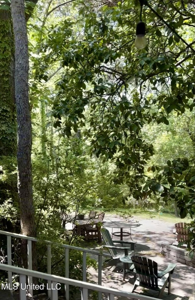 view of home's community featuring a patio