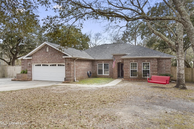 ranch-style house featuring brick siding, an attached garage, fence, and a shingled roof